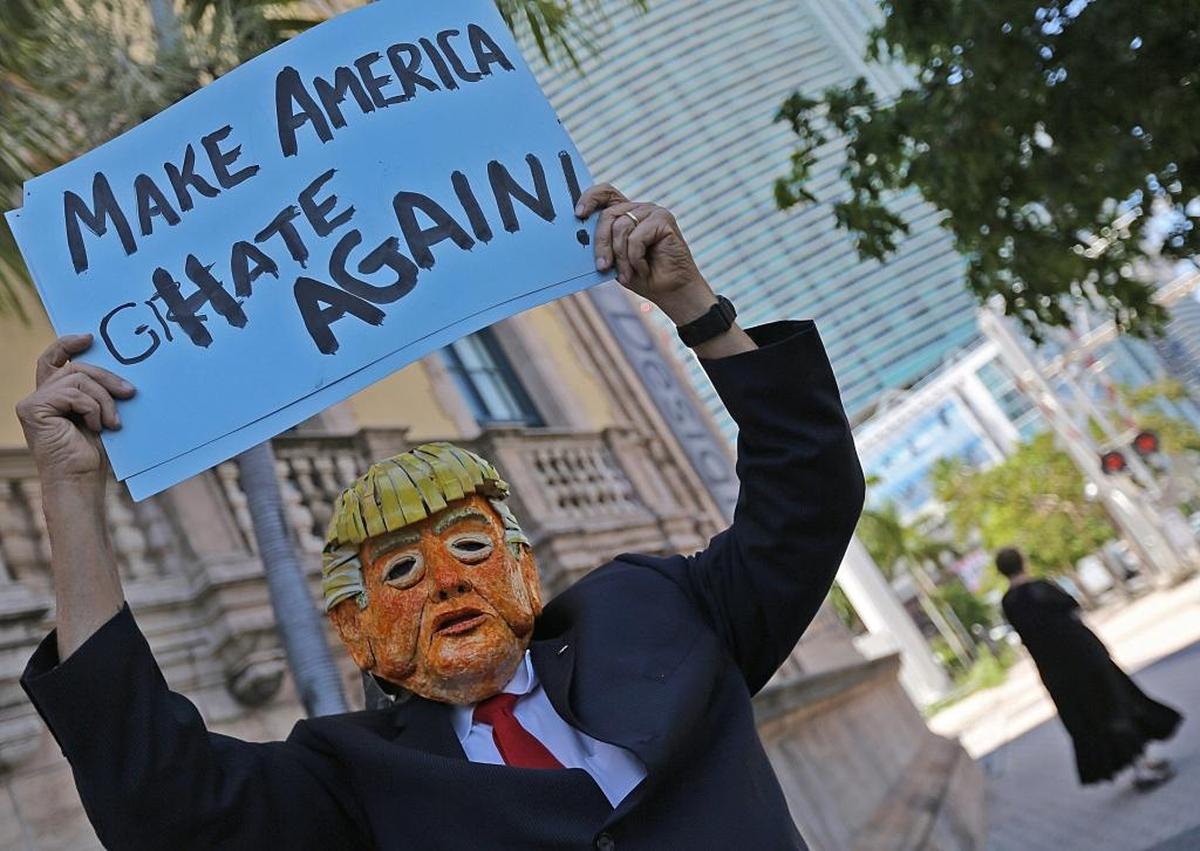 On Wednesday, Aug. 16, 2017, a protester disguised as President Donald Trump protested Trump’s recent comments over Saturday’s Charlottesville rally, in which neo-Nazis and white supremacists protested the city’s decision to remove a statue of Confederate Gen. Robert E. Lee from a park in the Virginia city. The protesters on Wednesday, who marched to Port of Miami from the Torch of Freedom, decried U.S. Attorney General Jeff Sessions, who was in Miami to praise the county for aiding federal authorities in their immigration detention requests.