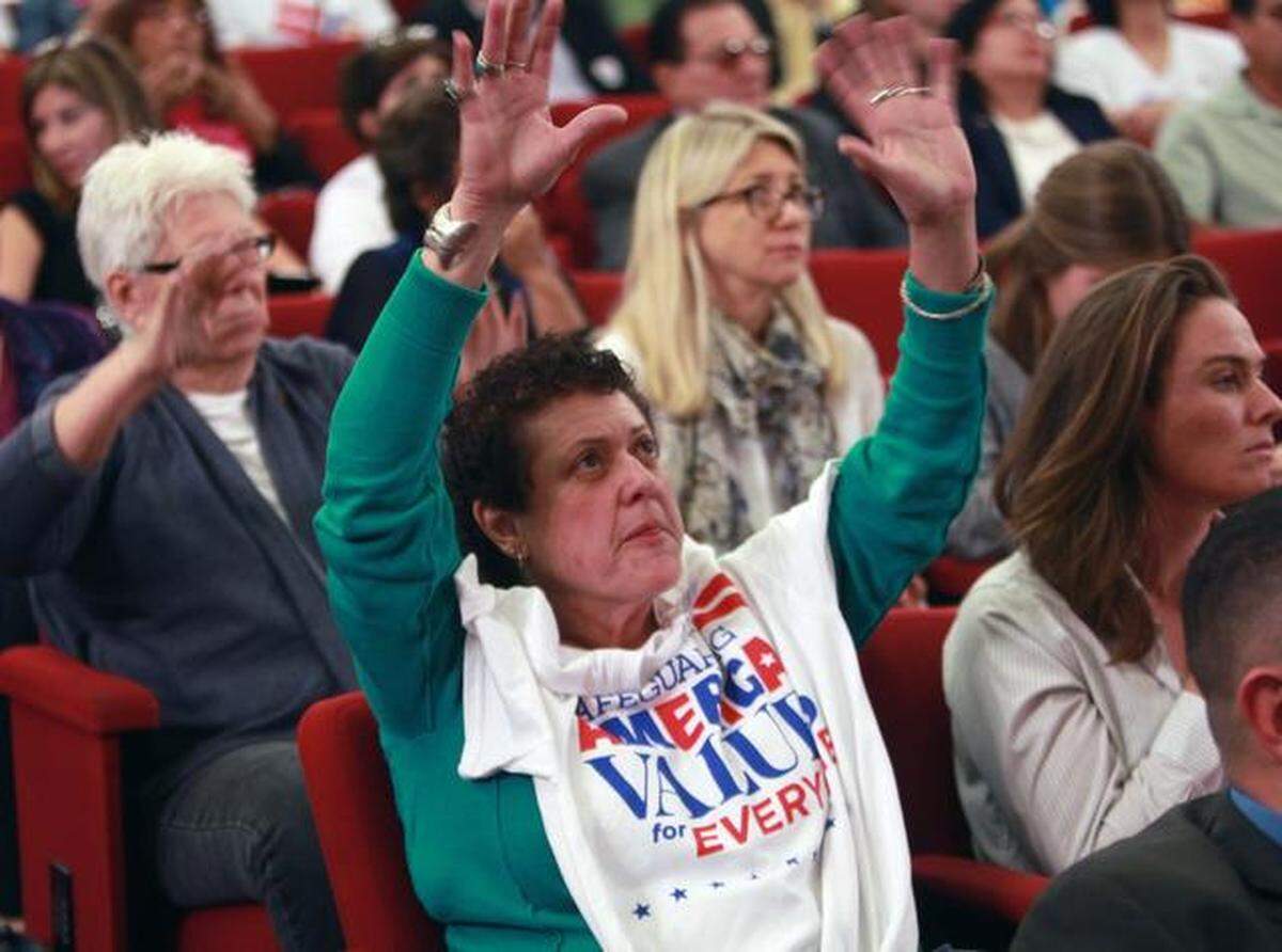 The Miami-Dade commission chambers were full during the Dec. 2, 2014 debate on whether to expand the county’s human rights ordinance to include transgender protections. The commission passed the legislation. The 2020 mayoral candidates voted differently: Esteban “Steve” Bovo Jr. voted No and Daniella Levine Cava voted Yes.