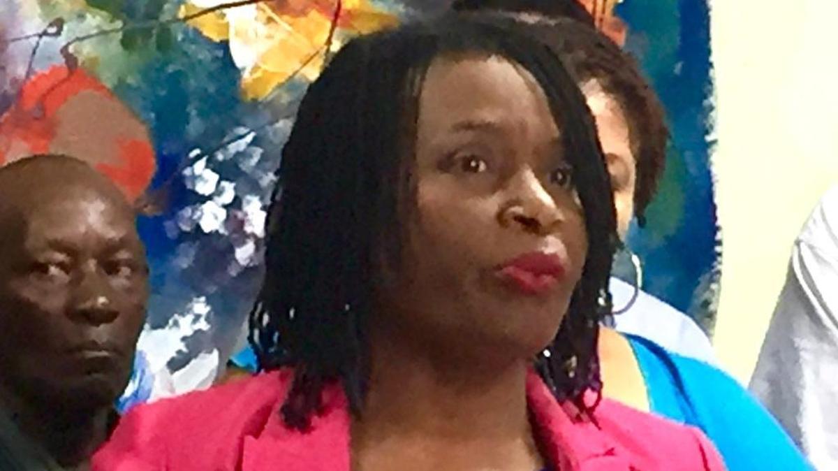 Marleine Bastien, of FANM (Haitian Women of Miami) speaks at a new conference urging the renewal of Temporary Protected Status for Haitians