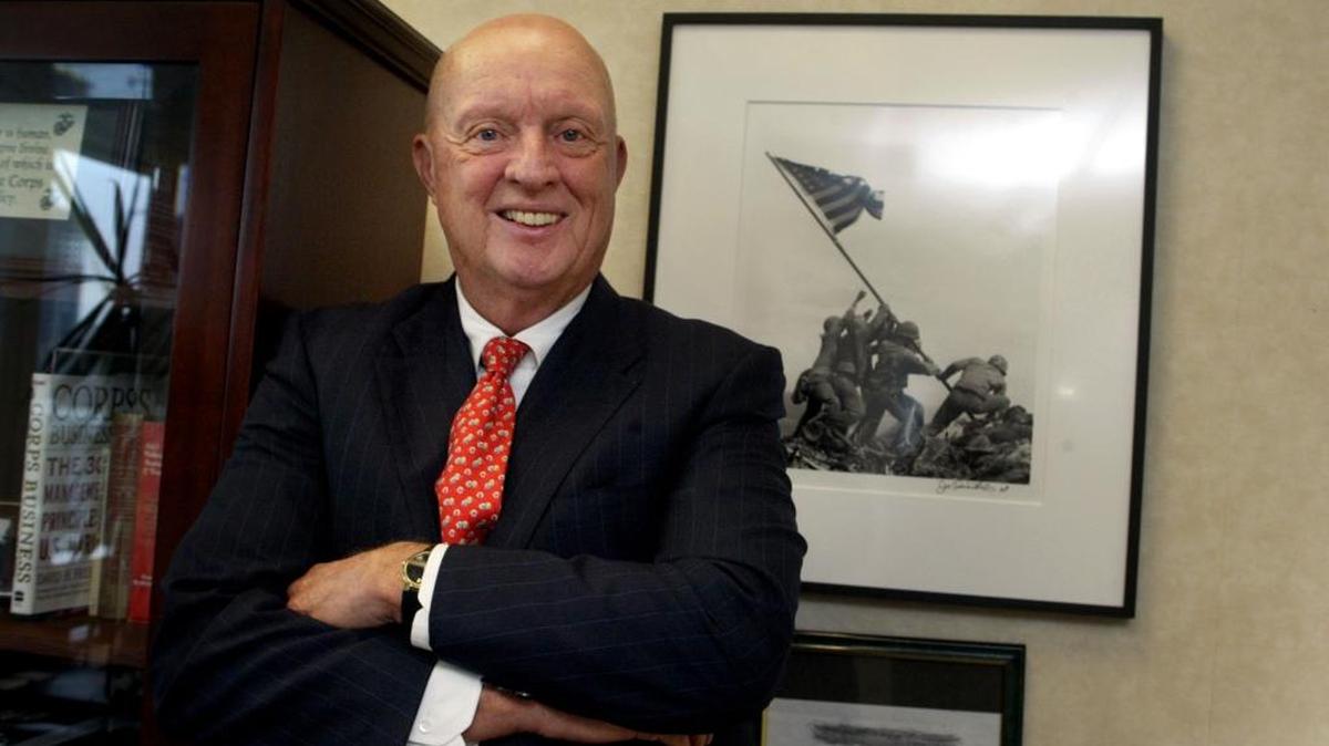 
Bill Allen Jr. stands in front of a photo of Iwo Jima that was hanging in his office in 2006. He served in the U.S. Marines Corps.
