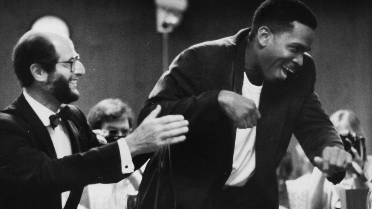 
Luther Campbell of 2 Live Crew and defense attorney Bruce Rogow rejoice in a Fort Lauderdale courtroom in 1990 after hearing the not-guilty verdict in the rapper’s obscenity case.
