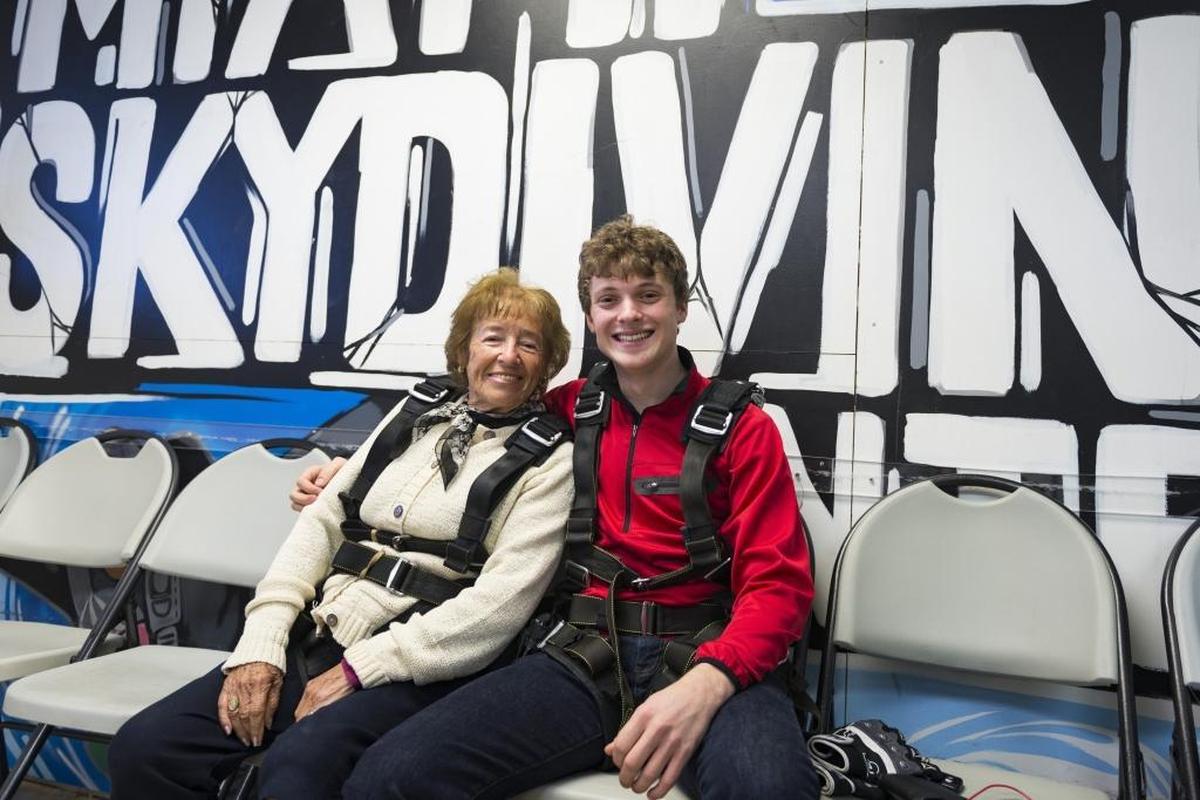 Henriette Siebenberg, 85, and her grandson, Shmuel Eisenmann, 18, pose before they skydive on Dec. 13, 2017.