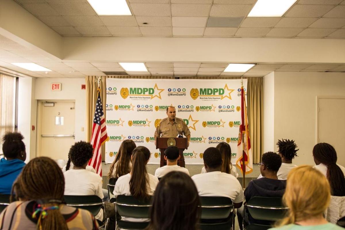 Miami-Dade Police Sgt. Joseph Bermudez speaks during the graduation ceremony of the department’s first Teen Citizen's Police Academy at headquarters in Doral on Friday, Aug. 18, 2017.