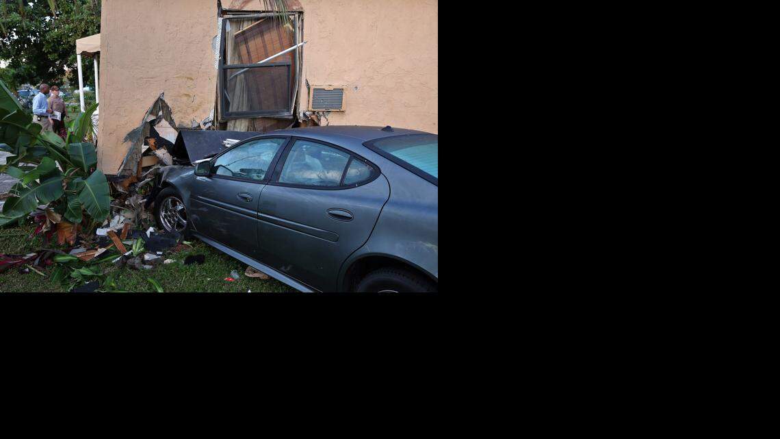 
Miami-Dade investigators examine the crash at 1105 NW 105th St. Monday morning.


