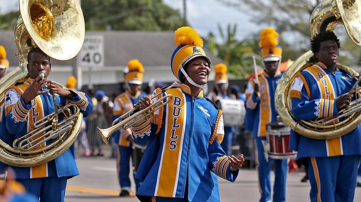 Northwestern High School Marching Bull Dominique Hightower (center) enjoys herself while performing in the Annual MLK Parade along Northwest 54th Street in Miami on Monday, Jan. 16, 2017.