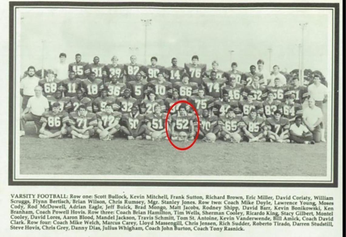 David Coriaty, circled in red, is pictured in a 1987 football team yearbook photo from Palm Beach Gardens High School.