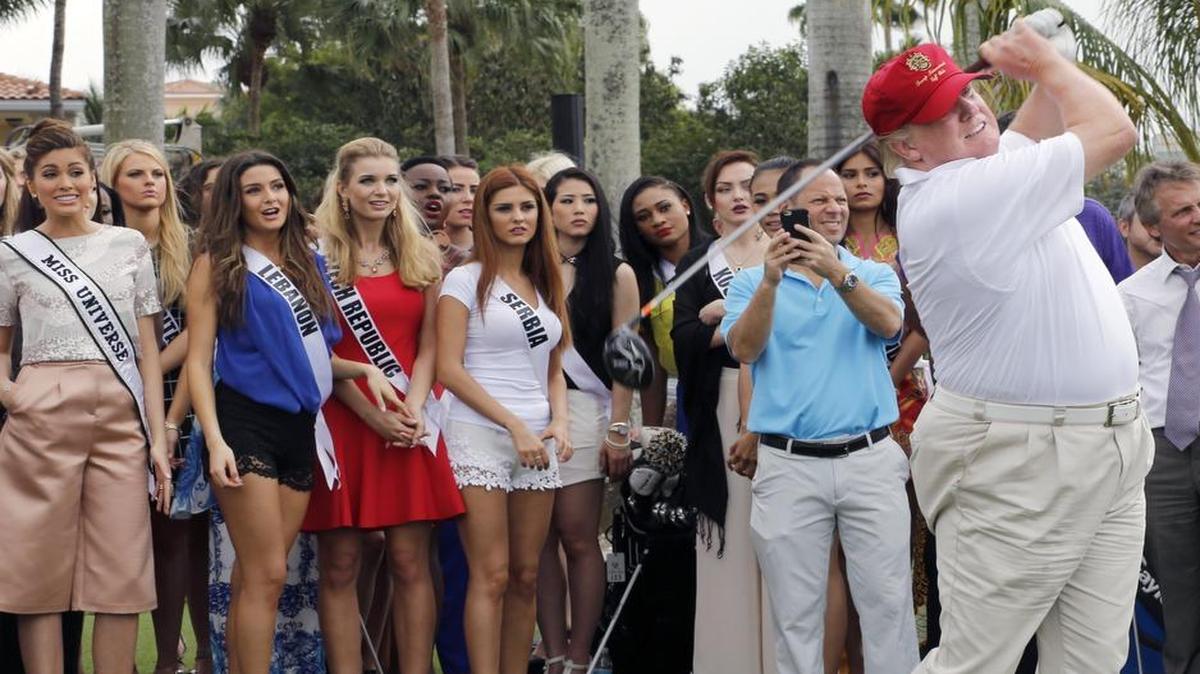 
Donald Trump on the Red Tiger golf course. Miss Universe contestants watch on the newly renovated golf course at Trump International Doral Miami on January 12, 2015.
