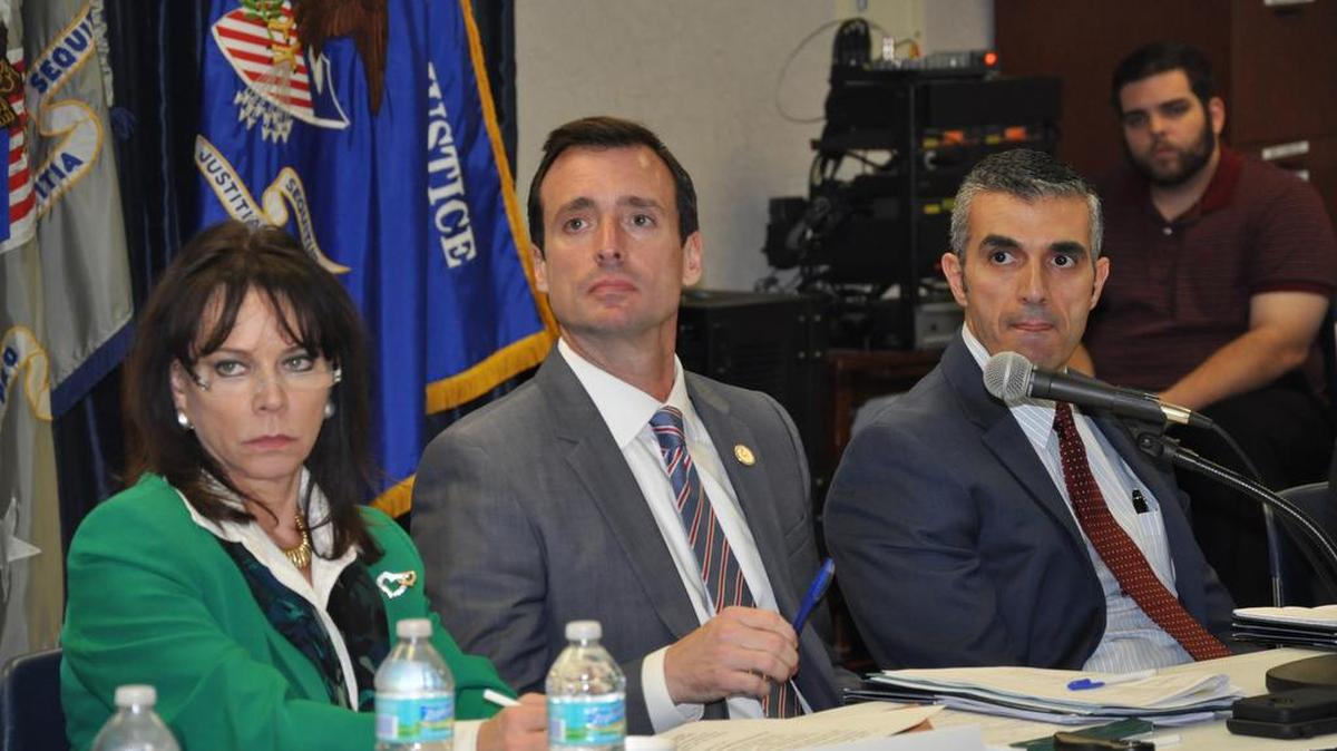 Miami-Dade State Attorney Katherine Fernández Rundle, left, U.S. Attorney Wifredo A. Ferrer, center, and George Piro, the FBI’s special agent in charge, listen during the forum.
