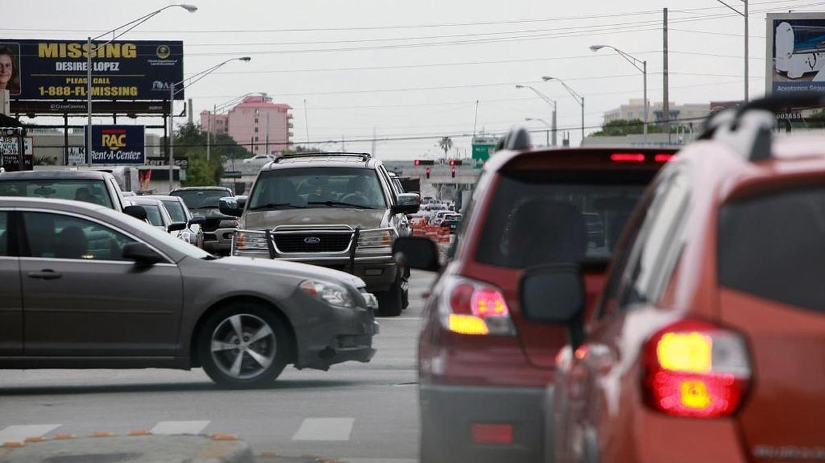 Two cars wait to make a left-hand turn on NW 27th Avenue and Seventh Street on Saturday, June 3, 2017. Neither are using their turn signal. The Chevy Blazer also waits to turn at the intersection without using a turn signal.