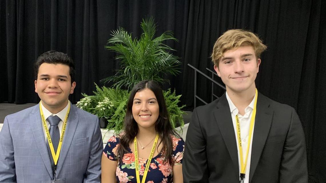 Fernando Bravo of the School for Advanced Studies, Nadeska Montalvan of G. Holmes Braddock High School and Pedro Dal Bo of MAST Academy on Key Biscayne.
