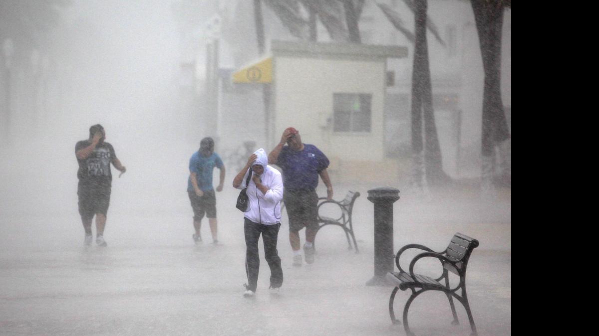 
In 2012, Tropical Storm Isaac pounded Hollywood Beach with rain.
