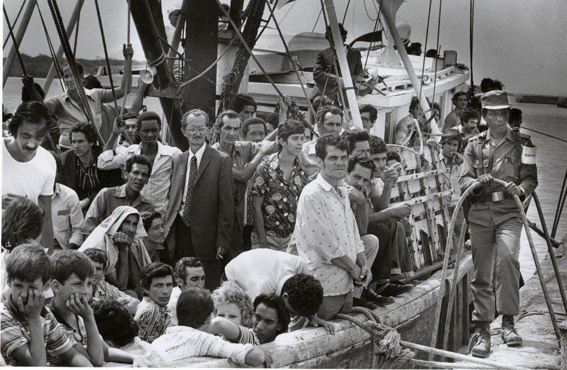 The Big Baby left Mariel with 216 Cubans bound for the U.S. A Cuban official is at right.