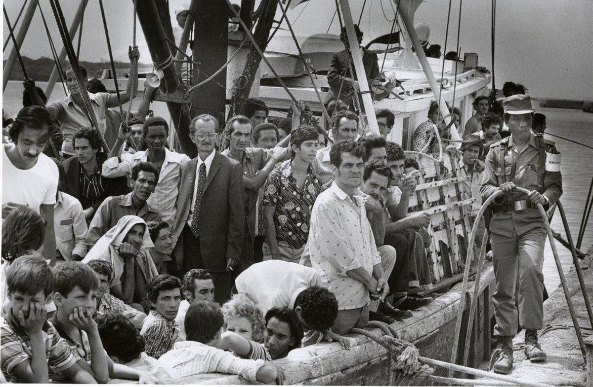 The Big Baby left Mariel with 216 Cubans bound for the U.S. A Cuban official is at right.