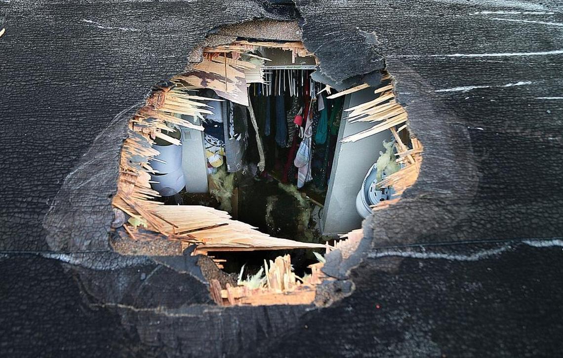 View of a hole in a roof of a home located in the14000 block of Northeast 10th Court, made by an inflatable raft that ‘separated’ from a Royal Canadian Air Force helicopter on its way back to Miami-Opa locka Executive Airport after an off-shore training exercise on Feb. 28, 2018.