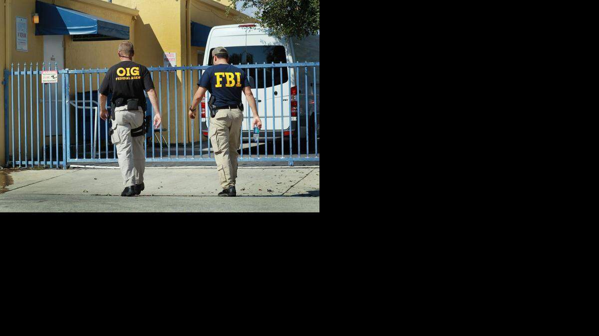 
Federal agents are shown here raiding a building in Miami in 2010 during an operation to combat a $200 million Medicare fraud. The raid was not related to Jorge Portillo’s case. 
