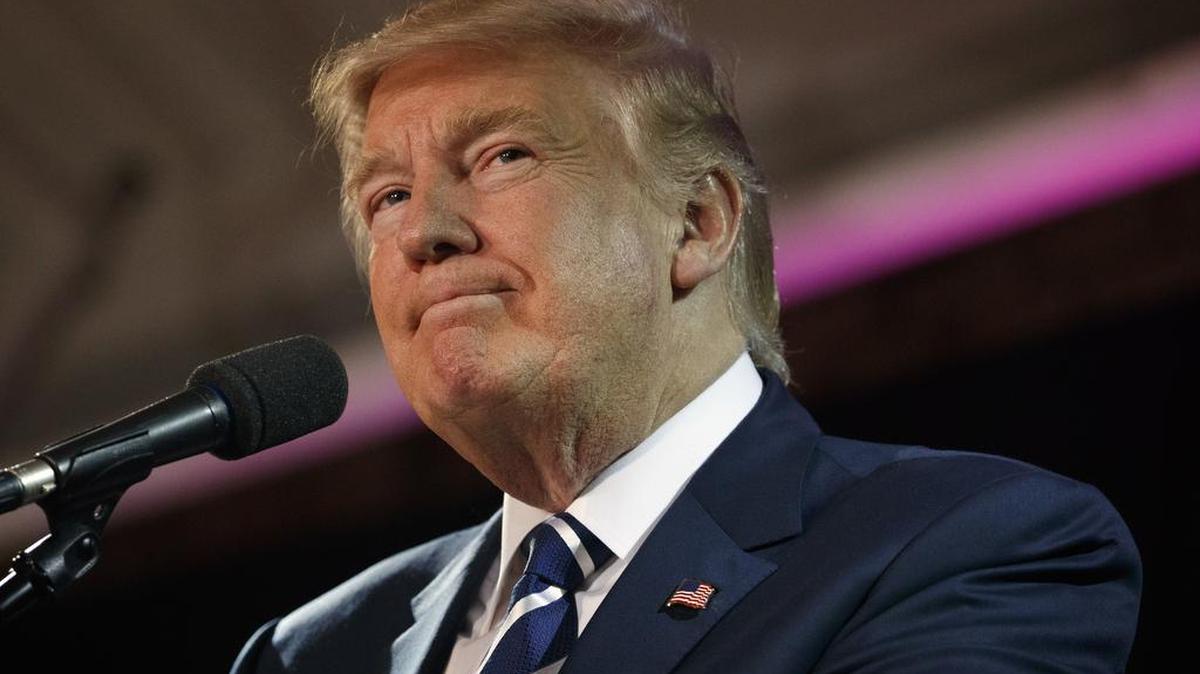 Republican presidential candidate Donald Trump pauses while speaking at a rally, Friday, Oct. 28, 2016, in Manchester, N.H. (AP Photo/ Evan Vucci)