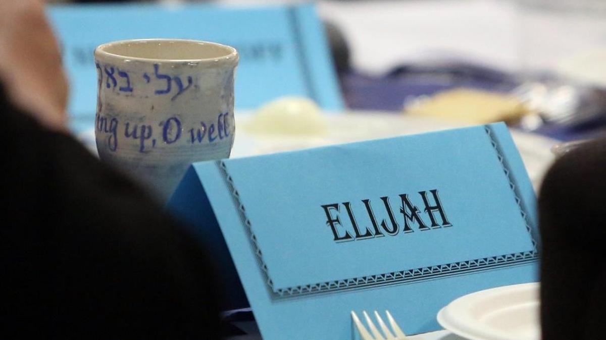A place setting for the prophet Elijah at a Passover Seder.