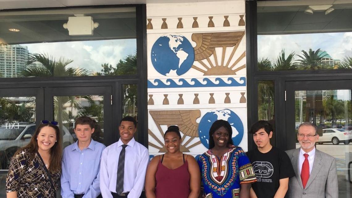 From left: Take Stock in Children Miami Executive Director Joanne Messing, Christopher Bellina, Stephen Kinchen, Abigail Ruiz, Terrneisha Flourny, Take Stock in Children Miami Chief Service Officer Raul Hernandez. The students are heading to Spain next week.
