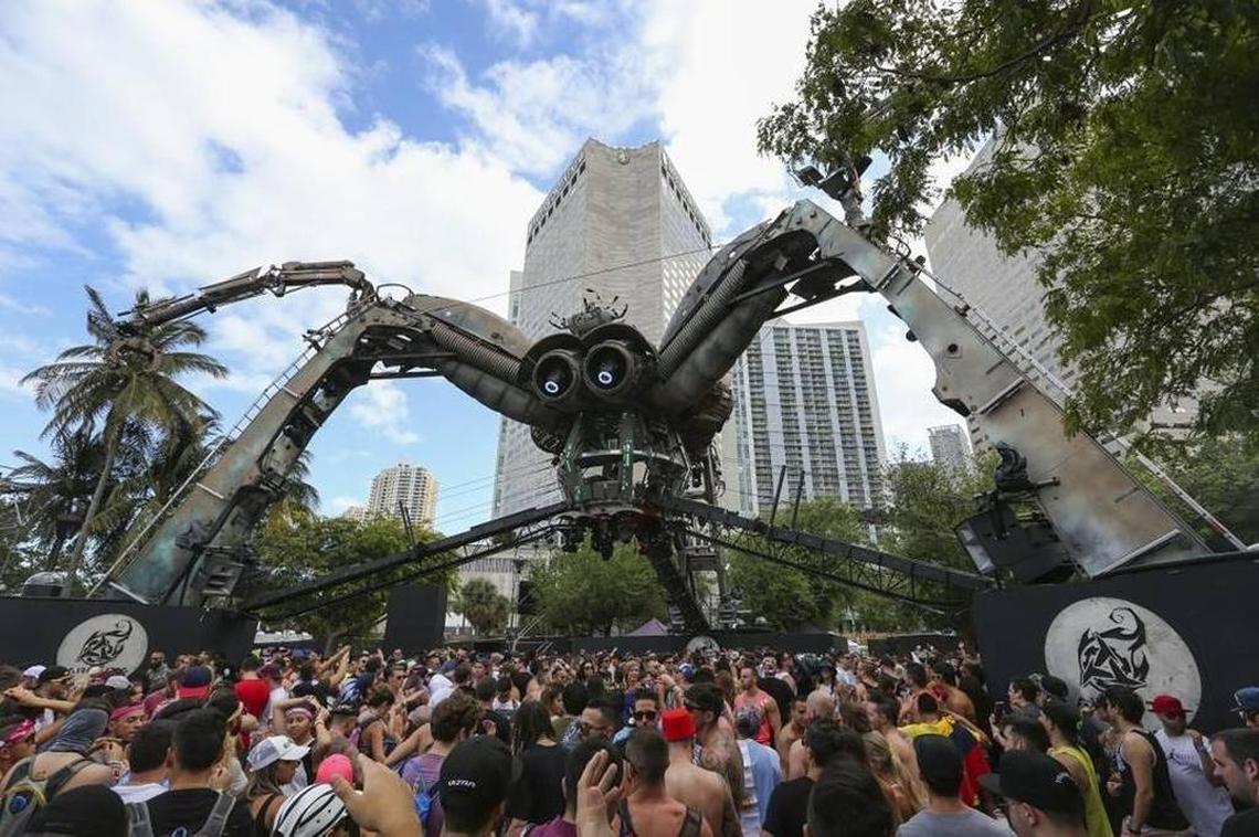 Guests dance at the Arcadia Spider stage during the third day of Ultra Music Festival in downtown Miami earlier this year — an event that also has drawn complaints from downtown residents.