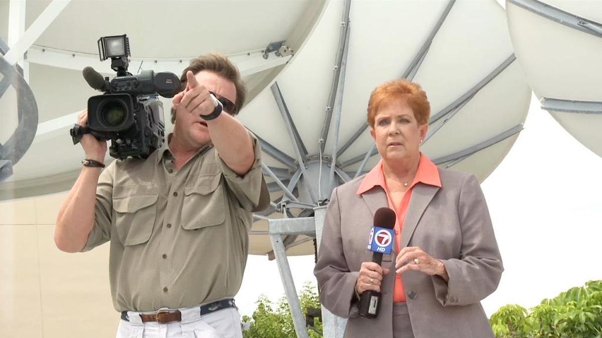 Carmel Cafiero working as a reporter for WSVN-Channel 7 in 2013.