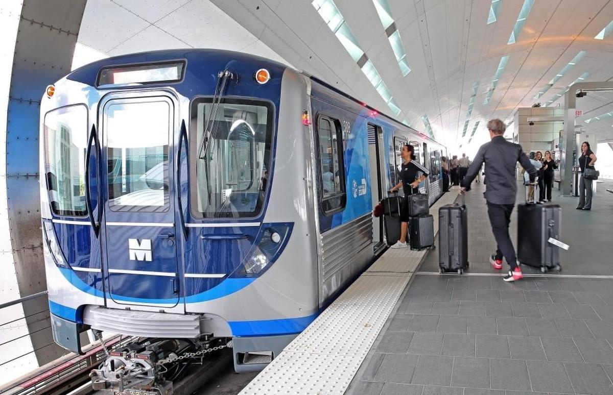 Passengers board the new Metrorail trains at the Miami International Airport terminal on Nov. 30, 2017. The new cars are the first of the fleet replacements expected to reduce the breakdowns and delays that have thrown the system into a crisis.