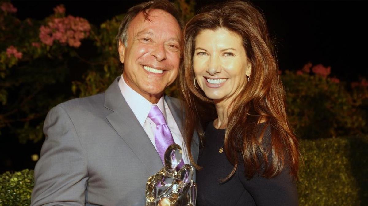 Health entrepreneur Mike Fernandez and his wife Constance Health with the 2018 Tocqueville Award for Outstanding Philanthropy from the United Way of Miami-Dade on Thursday, January 28, 2018.