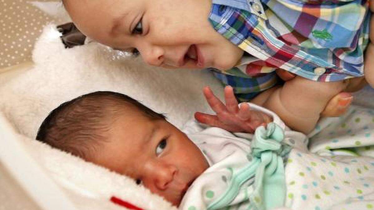 
Sebastian de la Cruz, the baby rescued by his aunt, Pamela Rauseo on the 836 expressway, spends time with his new baby sister, Chloe de la Cruz.
