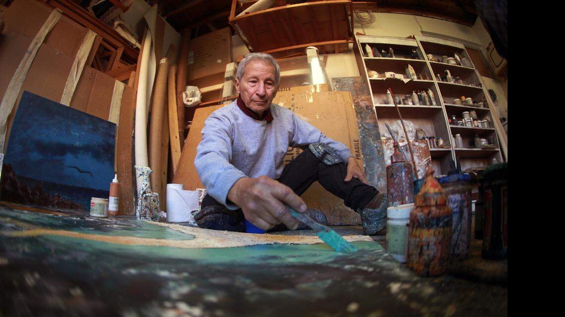 
Baruj Salinas works at his art studio in southwest Miami. The artist is working on paintings that form part of the Torah project, celebrating the 50th anniversary of The Shrine of the Book, a building that occupies a wing in the Museum of Israel in Jerusalem and houses important historical documents such as scrolls about the Dead Sea.
