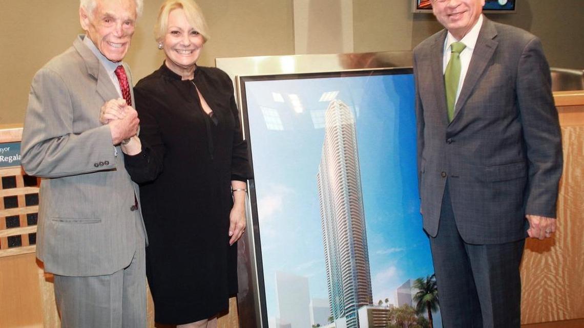 Developer Tibor Hollo (L), attorney Mirta “Mikki” Canton and Mayor Tomás Regalado pose at Miami City Hall with an artist’s rendering of the Panorama Tower, which received funding through Miami’s Office of International Business Development.