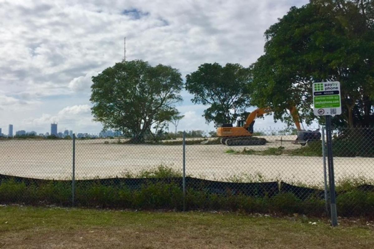 A new parking sign adjacent to landfill clean-up project on Virginia Key