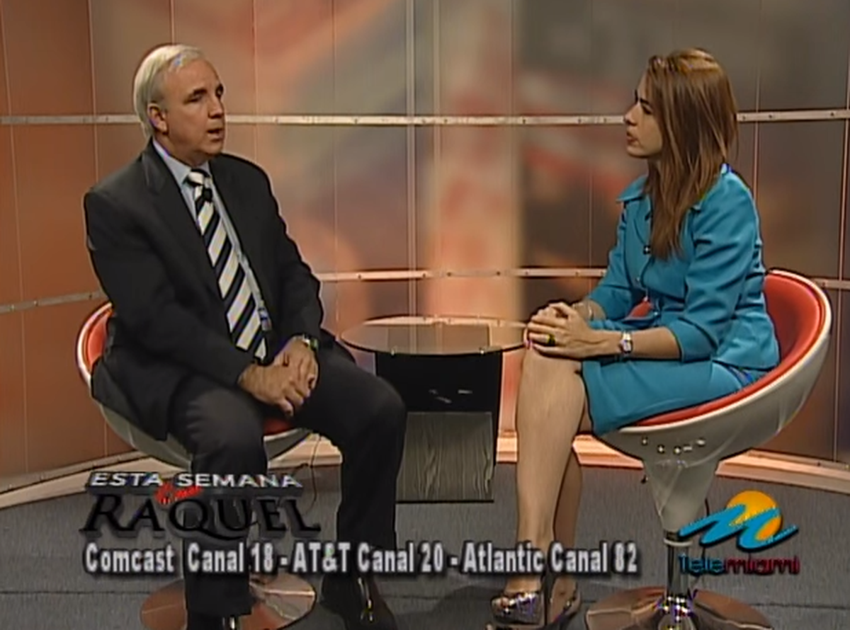 A screen shot from less contentious times. In 2011, Raquel Regalado had newly elected Miami-Dade Mayor Carlos Gimenez on her television show. Now she’s challenging him for reelection, and his lawyers are challenging her dual role as broadcaster and candidate.