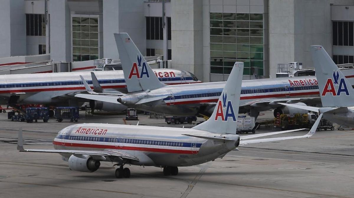 
American Airlines aircraft sit on the tarmac at Miami International Airport
