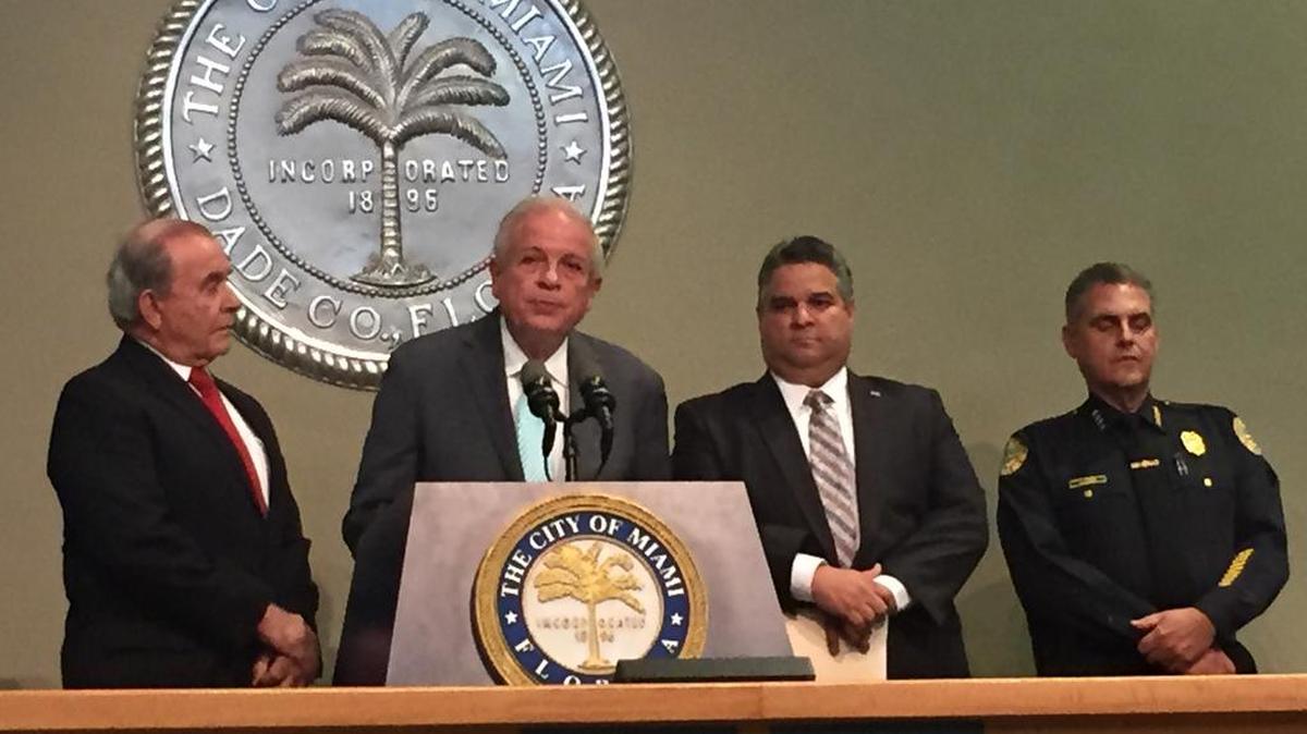 
Miami Commission Chairman Wifredo ‘Willy’ Gort, Mayor Tomás Regalado, City Manager Daniel Alfonso and Police Chief Rodolfo Llanes speak at a press conference Thursday at Miami City Hall about public safety. 
