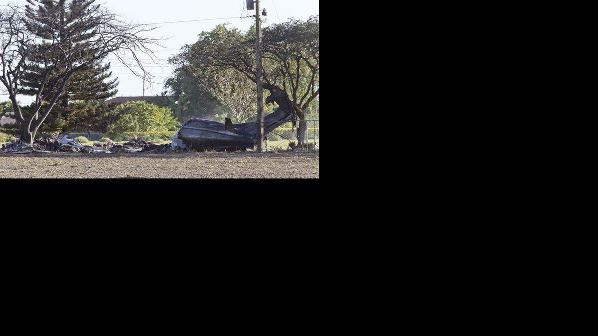 
PLANE CRASH: The Beech 1900C aircraft lies in a field just off Krome Avenue and Southwest 144th Street on Feb. 11, 2015, after it crashed while en route to Venezuela. A preliminary NTSB report revealed that the plane’s left engine propeller was overhauled in Opa-locka Executive Airport and installed at Miami Executive Airport two days prior to the flight.
