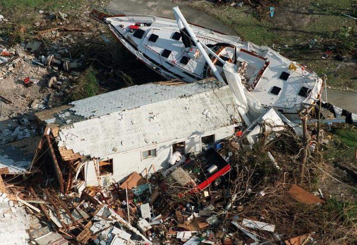 Storm surge from Hurricane Andrew swept cars, boats, and houses inland in South Miami-Dade County in 1992.