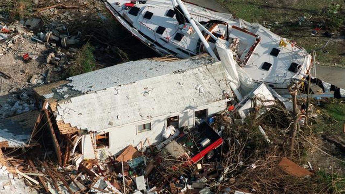 
Storm surge from Hurricane Andrew swept cars, boats, and houses inland in South Miami-Dade County in 1992.
