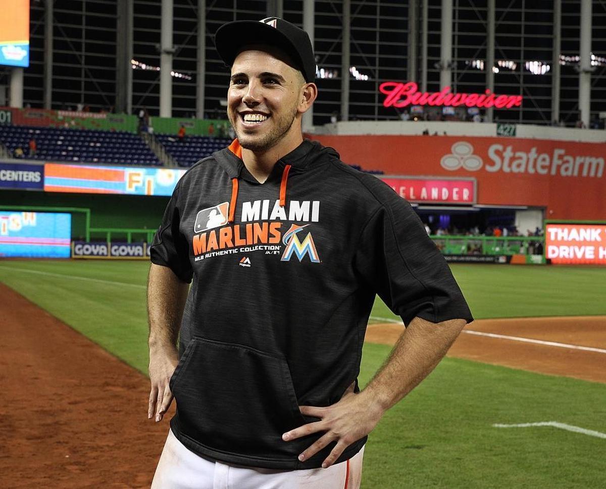 Miami Marlins’ pitcher Jose Fernandez, gestures to the stands as he celebrates the Marlins’ 4-1 victory against the Los Angeles Dodgers at Marlins Park in Little Havana in Miami on Sept. 9, 2016. The families of two men who were with Jose Fernandez on his boat when it crashed sued Fernandez’s estate.