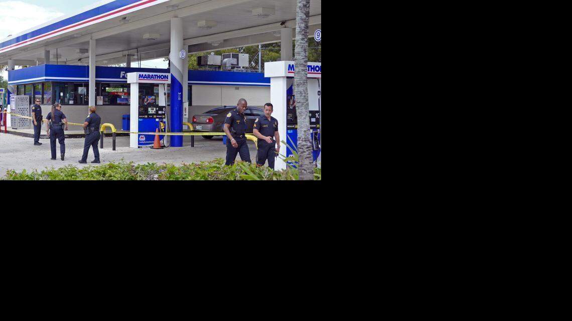 
Miami police work a shooting scene at the Marathon Gas Station at Southwest 37th Avenue and 16th Street on Monday, March 30, 2015. 

