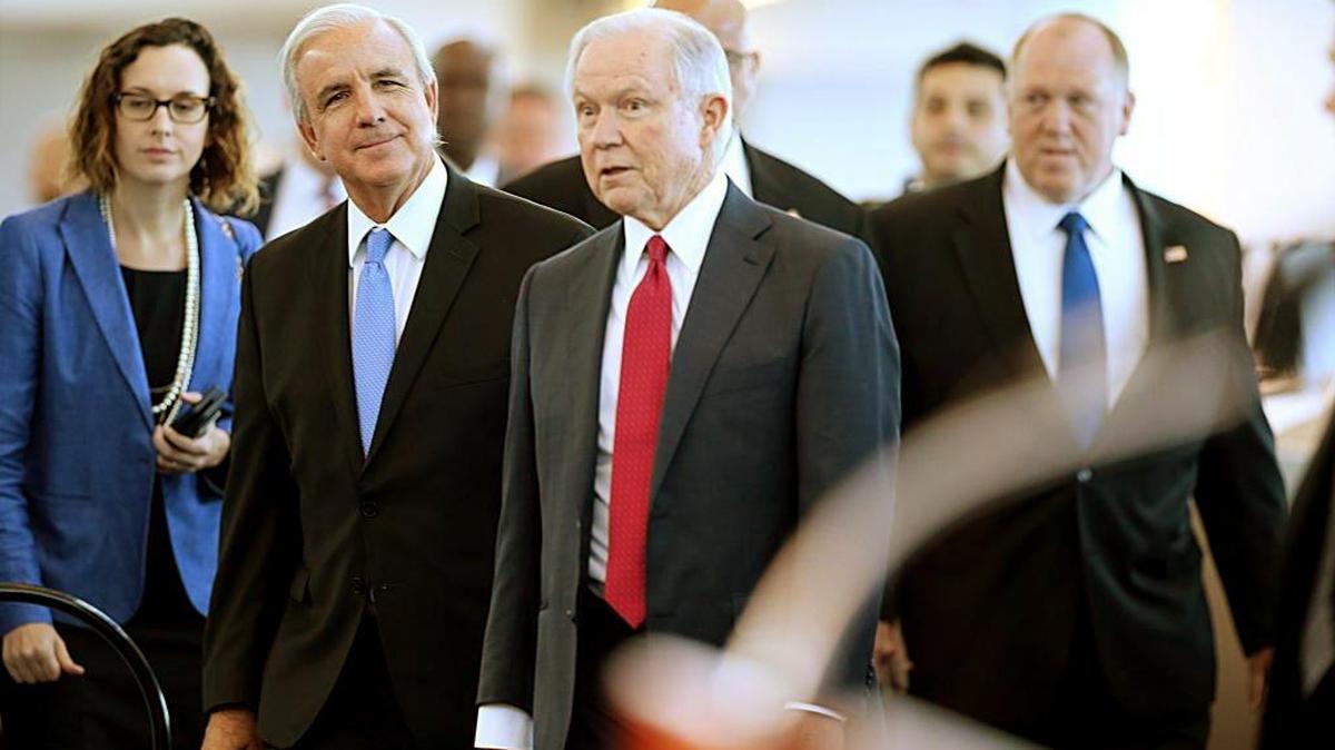 Miami Dade County Mayor Carlos Gimenez (second from left),with U.S. Attorney General Jeff Sessions before the nation’s top law enforcement official gave a speech on the need for immigration enforcement during a speech at the Port of Miami on Aug. 16, 2017.