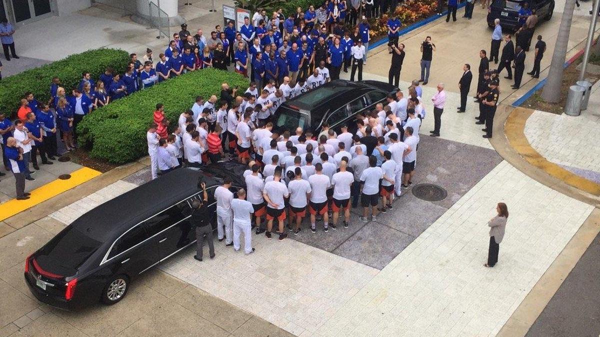 Marlins players surround the hearse before pitcher Jose Fernandez’s funeral procession at Marlins Park