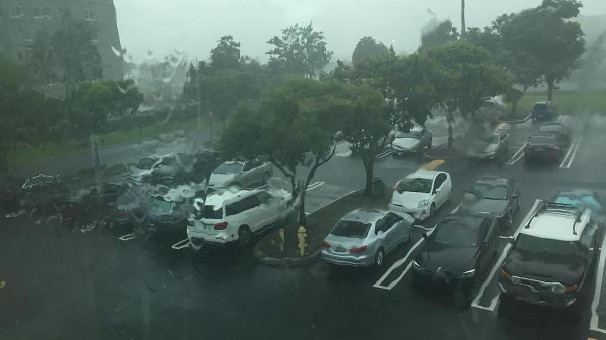 
Strong thunderstorm drop heavy rain in a Doral parking lot. The area is under a flood advisory until 8:30 p.m.
