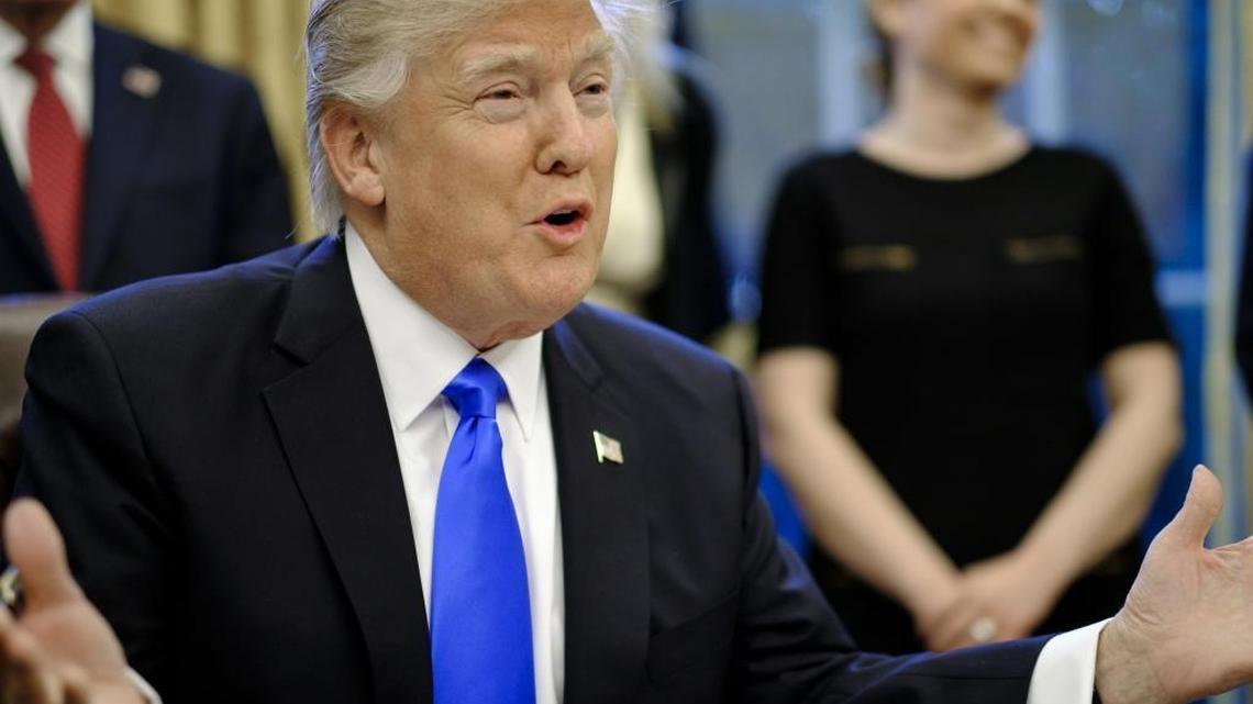 U.S. President Donald Trump speaks after signing executive orders related to a lobbying ban in the Oval Office on Saturday.