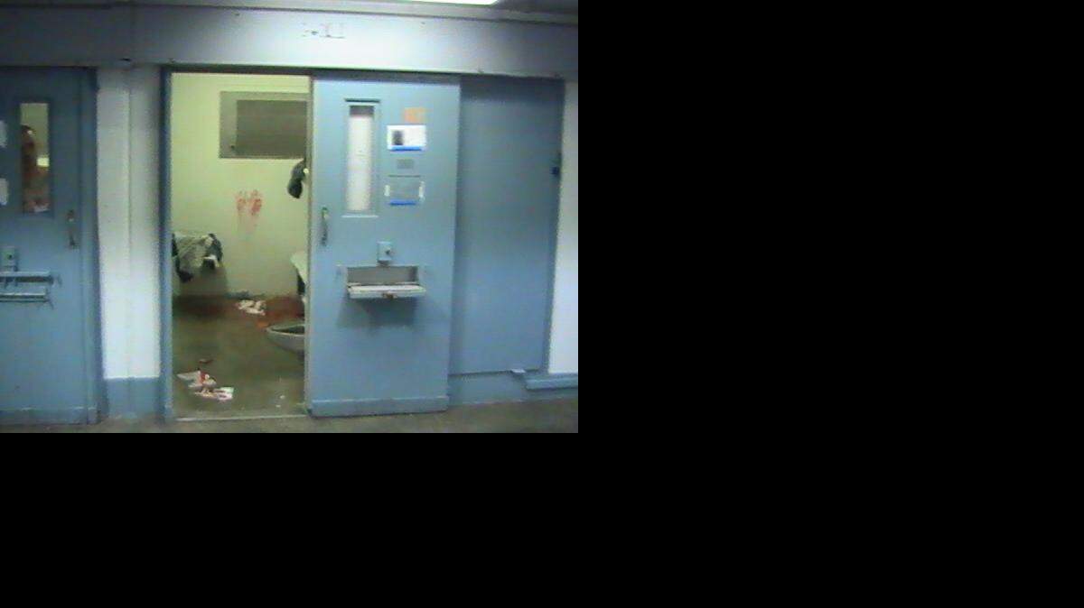 
The prison cell where guards found Ricky Martin dead was awash in blood. Surveillance video shows a guard peeking in the cell nine minutes earlier. He said he saw nothing amiss.
