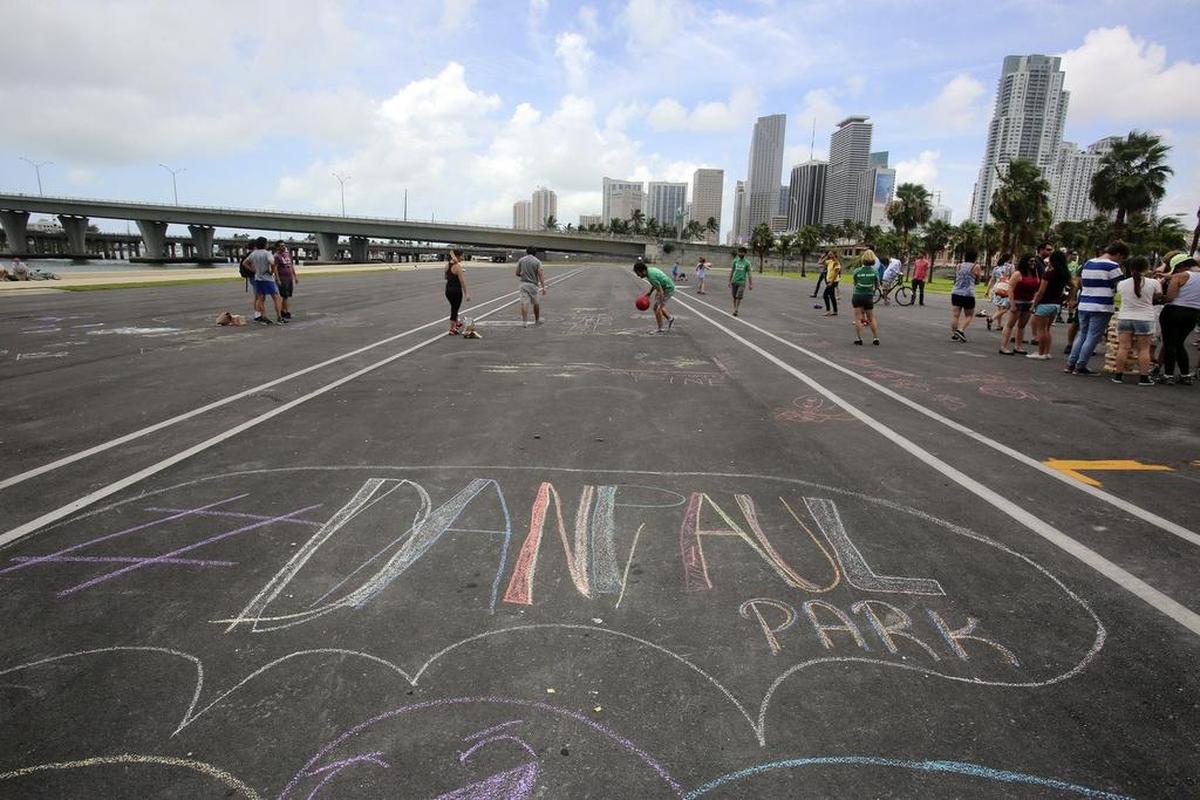Protesters at a 2015 demonstration showed their support for renaming Parcel B behind AmericanAirlines Arena Dan Paul Park, after the late advocate for public access to bayfront land.