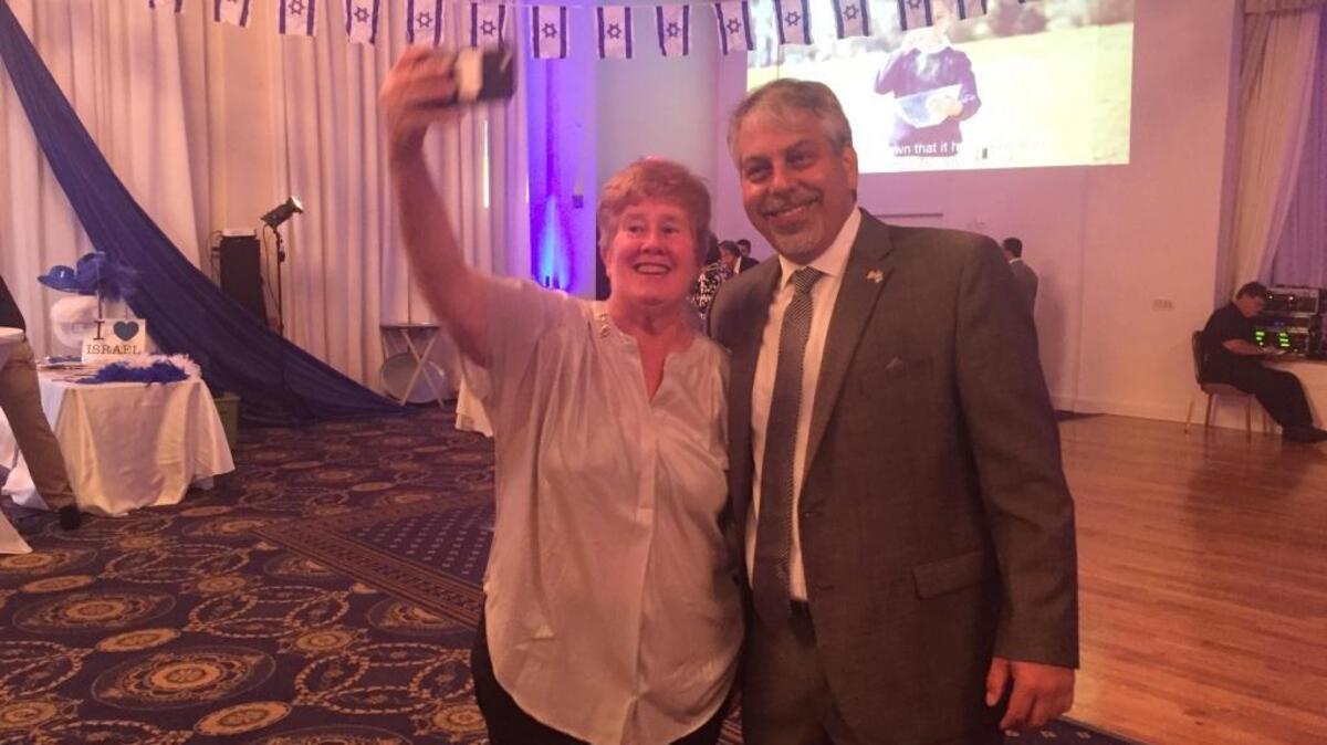 Miami-Dade Commissioner Sally Heyman takes a selfie with the Consul General to Florida and Puerto Rico at the 68th Israel Independence Day reception Sunday at Aventura Turnberry Jewish Center.