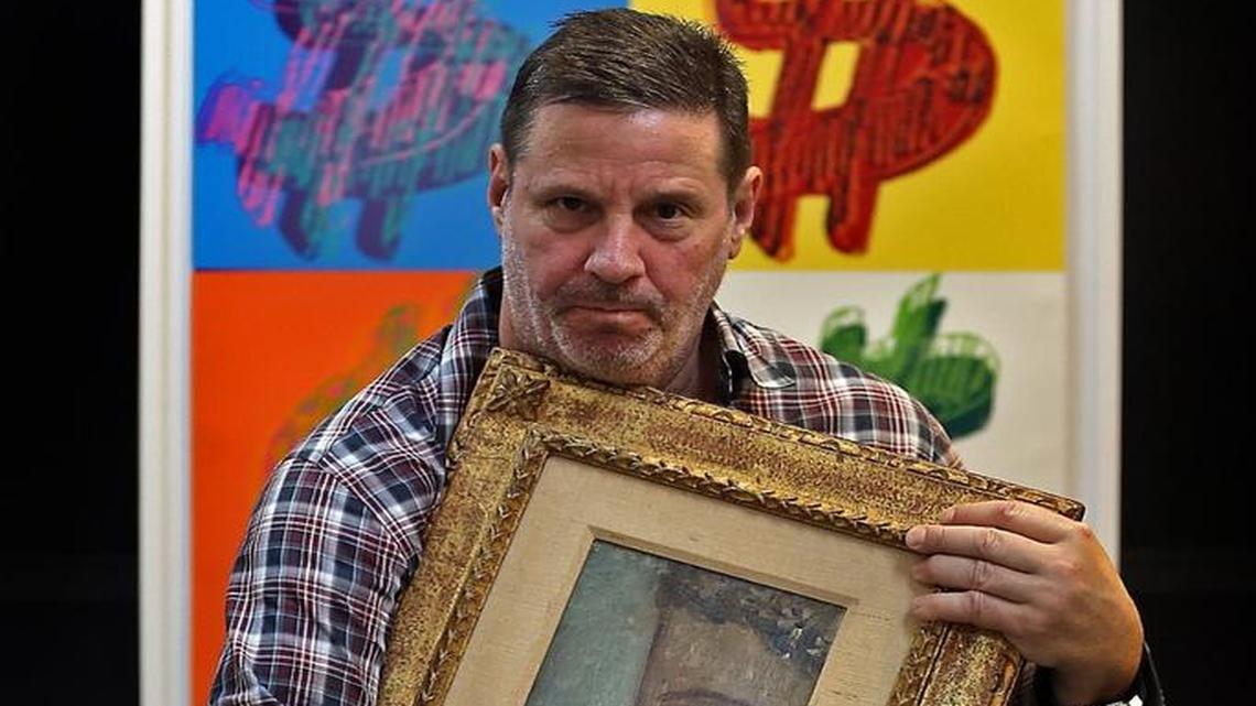 Gallery Art owner Kenneth Hendel holds on tightly to Picasso's ‘Portrait de Marie-Therese’ at his gallery in Aventura on Wednesday, April 20, 2016. Hendel received a letter from a New York law firm saying that the Picasso in his gallery was stolen from the Tisch family. The gallery owner contends he bought the art from another dealer - paid $350,000 for it — and that he knows nothing about it being stolen.