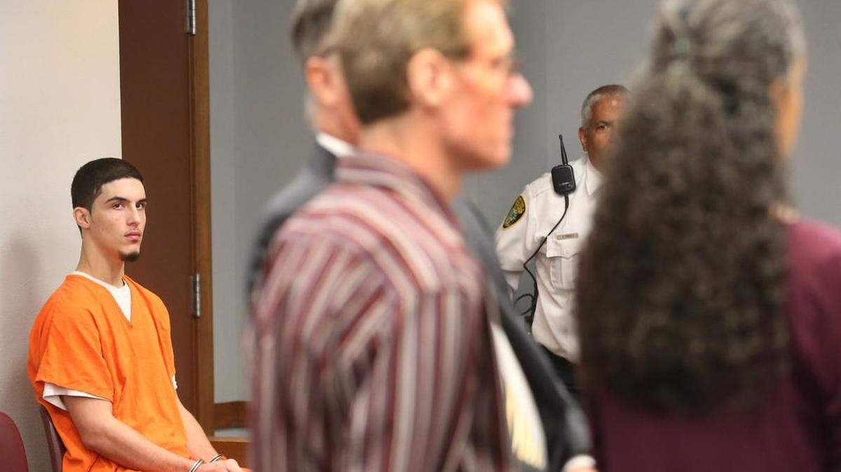 Lucas Seeger, charged in a rare homicide case in Aventura, watches his parents speak to the judge on his behalf in court on Tuesday, April 17, 2018.