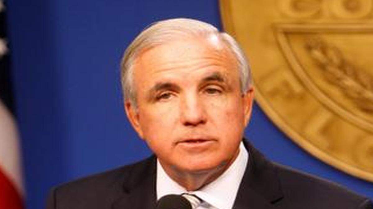 
Miami-Dade Mayor Carlos Gimenez unveils his draft county budget at County Hall on Tuesday, July 8.
