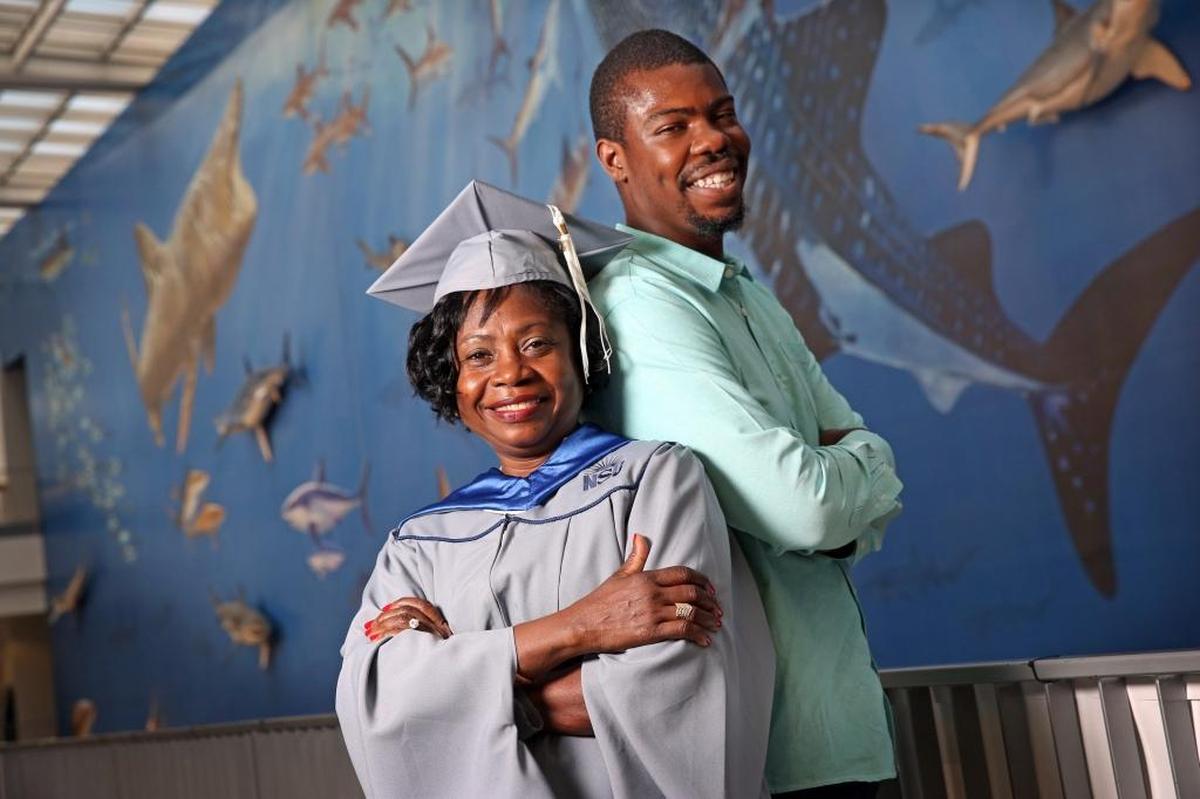 Damaris Hall, 58 who is graduating with her master’s degree in national security affairs at Nova Southeastern University’s department of history and political science, is pictured with her son, James Hall, 23, who is also a student at NSU working on his master’s in international business. Damaris has completed six tours of duty in the U.S. Air Force in Afghanistan, Pakistan, Emirates and Kyrgyzstan and will be graduating in June.