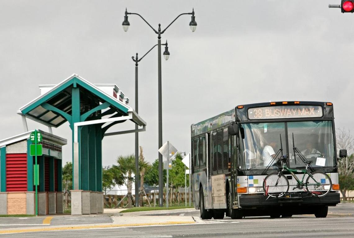 A Miami-Dade bus pulls away from a Homestead stop on the dedicated Busway, which has reduced travel times in South Miami-Dade.